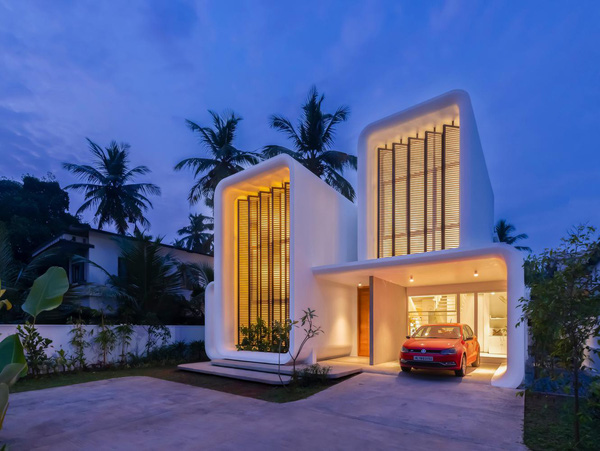 Độc đáo ngôi nhà hình chiếc điện thoại di động, dùng cửa chớp trục xoay để thông gió